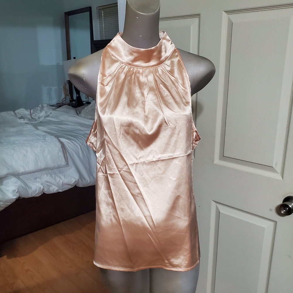 Golden champagne sleeveless blouse with a silky satin finish. Size large